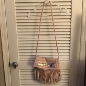 Beige purse with fringe